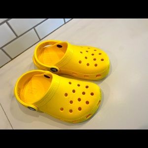 Yellow kids crocs